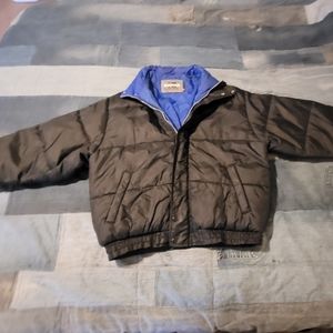 Koman sport winter coat, black with blue linning. New no tags